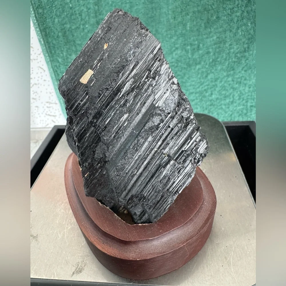Black tourmaline on wooden stand base